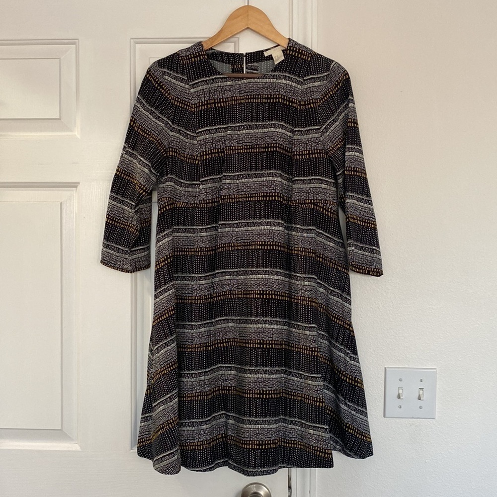 H&M bohemian boxy a-line dress with quarter length sleeves.